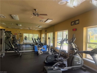 This spacious condo has updraded travertine tile throughout on Gateway Golf and Country Club in Florida - for sale on GolfHomes.com, golf home, golf lot