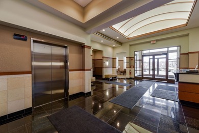 Well-maintained 7th-floor unit featuring two spacious bedrooms on Seven Bridges Golf Club in Illinois - for sale on GolfHomes.com, golf home, golf lot