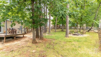 Lake view, large flat yard, fully updated, and truly move-in on Tega Cay Golf Club in South Carolina - for sale on GolfHomes.com, golf home, golf lot