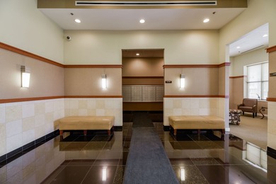 Well-maintained 7th-floor unit featuring two spacious bedrooms on Seven Bridges Golf Club in Illinois - for sale on GolfHomes.com, golf home, golf lot