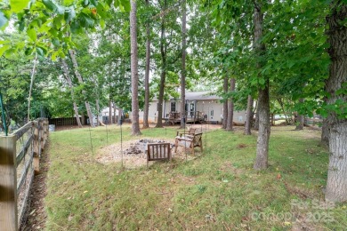 Lake view, large flat yard, fully updated, and truly move-in on Tega Cay Golf Club in South Carolina - for sale on GolfHomes.com, golf home, golf lot