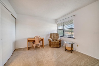 This is the best-priced unit in Villas de Golf and is available on Largo Golf Course in Florida - for sale on GolfHomes.com, golf home, golf lot