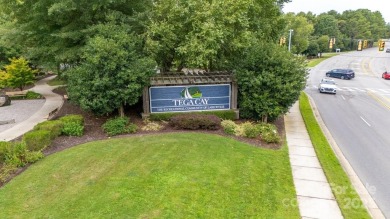Lake view, large flat yard, fully updated, and truly move-in on Tega Cay Golf Club in South Carolina - for sale on GolfHomes.com, golf home, golf lot