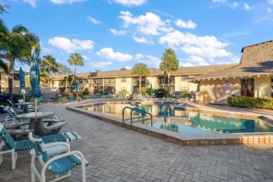 This is the best-priced unit in Villas de Golf and is available on Largo Golf Course in Florida - for sale on GolfHomes.com, golf home, golf lot