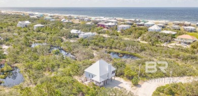 Exquisite Gold Fortified Coastal Retreat in Fort Morgan's on Kiva Dunes Golf Club in Alabama - for sale on GolfHomes.com, golf home, golf lot
