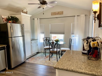 This is a beautifully 1993 updated unit (2019) that's located on on Fountain of the Sun Country Club in Arizona - for sale on GolfHomes.com, golf home, golf lot