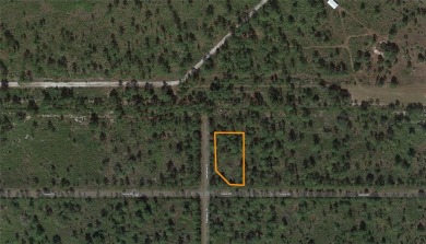One-half acre corner lot located in the lake community of Indian on Indian Lake Estates Golf and Country Club in Florida - for sale on GolfHomes.com, golf home, golf lot