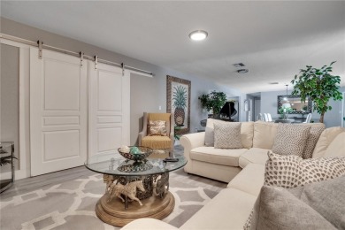 FULLY FURNISHED! Welcome to 8060 Canterbury Chase, Largo on Bayou Golf Club in Florida - for sale on GolfHomes.com, golf home, golf lot