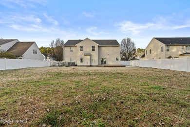 Bring the family to this spacious home featuring 6 bedrooms or 5 on Eagle Creek Golf Club and Grill in North Carolina - for sale on GolfHomes.com, golf home, golf lot