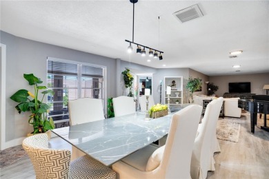 FULLY FURNISHED! Welcome to 8060 Canterbury Chase, Largo on Bayou Golf Club in Florida - for sale on GolfHomes.com, golf home, golf lot