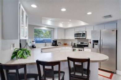 FULLY FURNISHED! Welcome to 8060 Canterbury Chase, Largo on Bayou Golf Club in Florida - for sale on GolfHomes.com, golf home, golf lot
