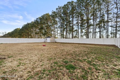 Bring the family to this spacious home featuring 6 bedrooms or 5 on Eagle Creek Golf Club and Grill in North Carolina - for sale on GolfHomes.com, golf home, golf lot