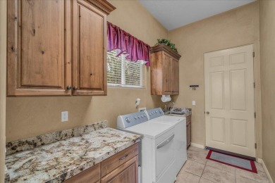 This single level home offers a unique blend of comfort, quality on Green Spring Country Club in Utah - for sale on GolfHomes.com, golf home, golf lot