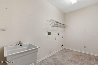 Come experience this immaculately maintained 4-bedroom, 3-bath on Toqua Golf Course - Loudon County in Tennessee - for sale on GolfHomes.com, golf home, golf lot