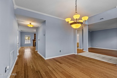 Bring the family to this spacious home featuring 6 bedrooms or 5 on Eagle Creek Golf Club and Grill in North Carolina - for sale on GolfHomes.com, golf home, golf lot