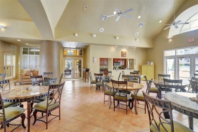 BRIGHT AND BEAUTIFULLY PRESENTED 2 BED / 2 BATH CONDO IN ROYAL on Gateway Golf and Country Club in Florida - for sale on GolfHomes.com, golf home, golf lot