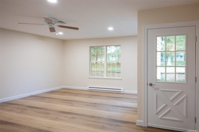 Absolutely gorgeous Carlton model end unitpletely renovated with on Leisure Village Golf Course in New York - for sale on GolfHomes.com, golf home, golf lot