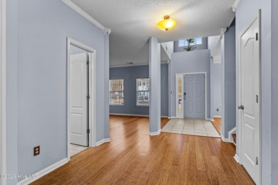 Bring the family to this spacious home featuring 6 bedrooms or 5 on Eagle Creek Golf Club and Grill in North Carolina - for sale on GolfHomes.com, golf home, golf lot