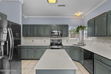 Bring the family to this spacious home featuring 6 bedrooms or 5 on Eagle Creek Golf Club and Grill in North Carolina - for sale on GolfHomes.com, golf home, golf lot