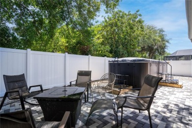 FULLY FURNISHED! Welcome to 8060 Canterbury Chase, Largo on Bayou Golf Club in Florida - for sale on GolfHomes.com, golf home, golf lot