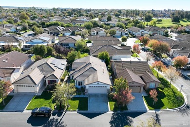 Charming single-story home in gated Trilogy at Rio Vista on Golf Club At Rio Vista in California - for sale on GolfHomes.com, golf home, golf lot