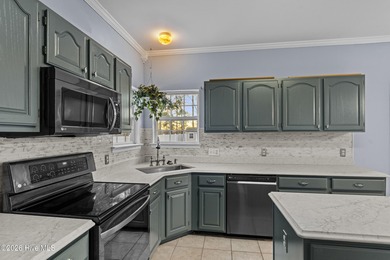 Bring the family to this spacious home featuring 6 bedrooms or 5 on Eagle Creek Golf Club and Grill in North Carolina - for sale on GolfHomes.com, golf home, golf lot