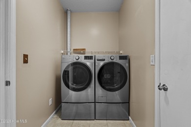 Bring the family to this spacious home featuring 6 bedrooms or 5 on Eagle Creek Golf Club and Grill in North Carolina - for sale on GolfHomes.com, golf home, golf lot