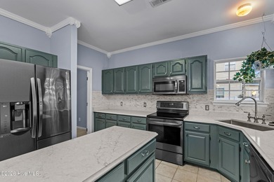 Bring the family to this spacious home featuring 6 bedrooms or 5 on Eagle Creek Golf Club and Grill in North Carolina - for sale on GolfHomes.com, golf home, golf lot