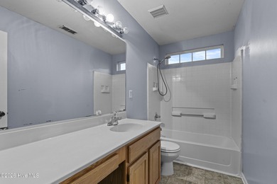 Bring the family to this spacious home featuring 6 bedrooms or 5 on Eagle Creek Golf Club and Grill in North Carolina - for sale on GolfHomes.com, golf home, golf lot