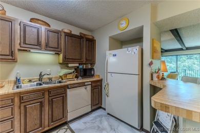 Spacious 3 bedroom condo offering generous living space & is on Seasons Ridge At Four Seasons in Missouri - for sale on GolfHomes.com, golf home, golf lot