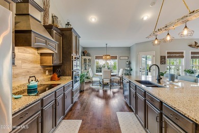 Located at the end of a quiet cul-de-sac in the prestigious golf on Brunswick Plantation and Golf Resorts in North Carolina - for sale on GolfHomes.com, golf home, golf lot