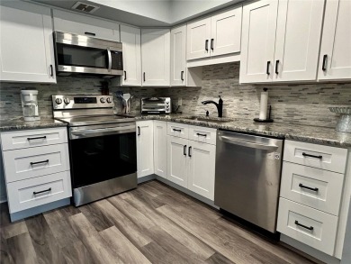 Welcome to your meticulously updated and furnished 2 bed, 1 bath on On Top Of The World Golf Course in Florida - for sale on GolfHomes.com, golf home, golf lot