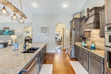 Located at the end of a quiet cul-de-sac in the prestigious golf on Brunswick Plantation and Golf Resorts in North Carolina - for sale on GolfHomes.com, golf home, golf lot