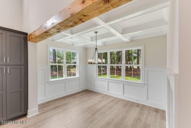 This brand new Riptide home with stunning setting and finishes on Sea Trail Golf Resort in North Carolina - for sale on GolfHomes.com, golf home, golf lot