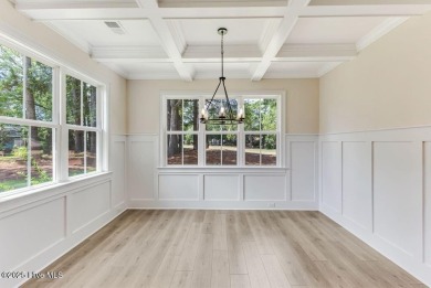 This brand new Riptide home with stunning setting and finishes on Sea Trail Golf Resort in North Carolina - for sale on GolfHomes.com, golf home, golf lot