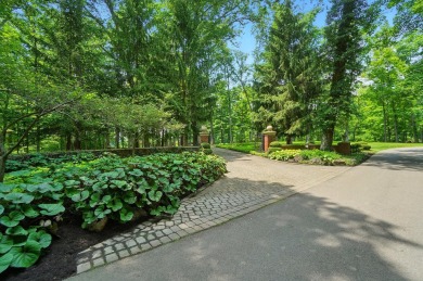 Set on over five private acres with commanding views of the 13th on Springfield Country Club in Ohio - for sale on GolfHomes.com, golf home, golf lot
