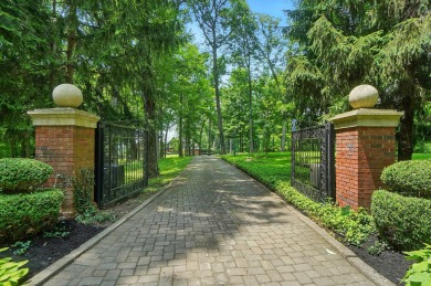Set on over five private acres with commanding views of the 13th on Springfield Country Club in Ohio - for sale on GolfHomes.com, golf home, golf lot