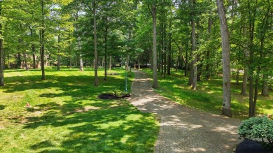 Set on over five private acres with commanding views of the 13th on Springfield Country Club in Ohio - for sale on GolfHomes.com, golf home, golf lot