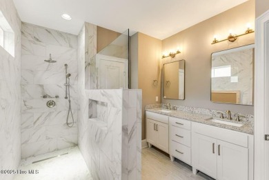 This brand new Riptide home with stunning setting and finishes on Sea Trail Golf Resort in North Carolina - for sale on GolfHomes.com, golf home, golf lot