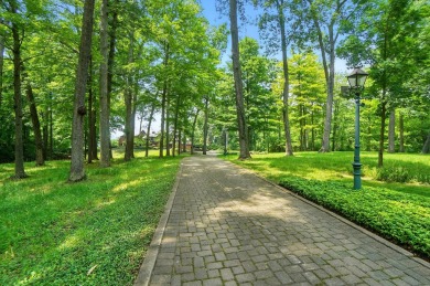 Set on over five private acres with commanding views of the 13th on Springfield Country Club in Ohio - for sale on GolfHomes.com, golf home, golf lot