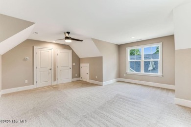 This brand new Riptide home with stunning setting and finishes on Sea Trail Golf Resort in North Carolina - for sale on GolfHomes.com, golf home, golf lot