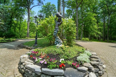 Set on over five private acres with commanding views of the 13th on Springfield Country Club in Ohio - for sale on GolfHomes.com, golf home, golf lot