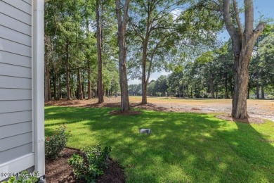 This brand new Riptide home with stunning setting and finishes on Sea Trail Golf Resort in North Carolina - for sale on GolfHomes.com, golf home, golf lot