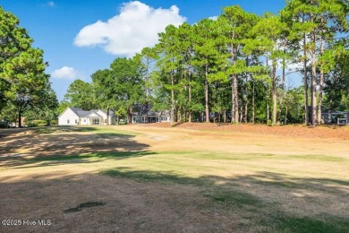 This brand new Riptide home with stunning setting and finishes on Sea Trail Golf Resort in North Carolina - for sale on GolfHomes.com, golf home, golf lot