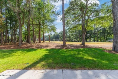 This brand new Riptide home with stunning setting and finishes on Sea Trail Golf Resort in North Carolina - for sale on GolfHomes.com, golf home, golf lot