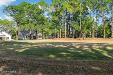 This brand new Riptide home with stunning setting and finishes on Sea Trail Golf Resort in North Carolina - for sale on GolfHomes.com, golf home, golf lot