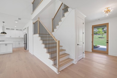 THIS GORGEOUS NEW CONSTRUCTION IS DIRECTLY ON OSPREY POINTE POND on Harbor Club Golf and Country Club in Georgia - for sale on GolfHomes.com, golf home, golf lot