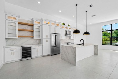 This amazing view complements the beautiful fully renovated 3 on BallenIsles Golf and Country Club in Florida - for sale on GolfHomes.com, golf home, golf lot