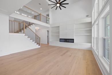 THIS GORGEOUS NEW CONSTRUCTION IS DIRECTLY ON OSPREY POINTE POND on Harbor Club Golf and Country Club in Georgia - for sale on GolfHomes.com, golf home, golf lot