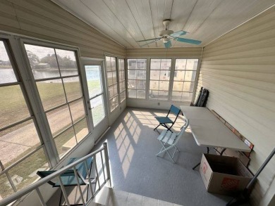 Located on a prime corner lot directly across from the clubhouse on Four Lakes Golf Club in Florida - for sale on GolfHomes.com, golf home, golf lot